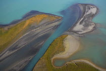 Aerial view over Lake Laitaure showing silt deposits from the Rapa river forming sand spits and vegetational growth, Sarek National Park, Sweden., September 2008