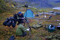 Camera crew from Gulo films setting up crane for filming, Sarek National Park, Laponia World Heritage Site, Lapland, Sweden, September 2008