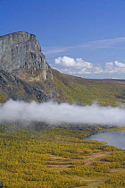 First rays of morning sun on Skierffe mountain, Sarek National Park, Laponia World Heritage Site, Lapland, Sweden, September 2008