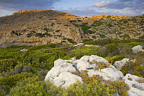 Rocky landscape with ancient ruins, evening, Antikythera island, Greece, September 2008