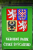 Coat of arms of the Ceske Svycarsko / Bohemian Switzerland National Park, Krinice River, Kyov, Czech Republic, September 2008