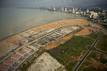 Aerial view of the waterfront of Georgetown, Penang, Malaysia and new coastal development. Georgetown, Pulau Pinang, Malaysia. May 2006