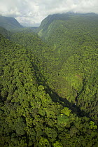 Aerial view of gorge of the Rio Ole, emerging from the Gran Caldera Volcanica de Luba, Bioko Island, Equatorial Guinea, Central Africa. January 2008