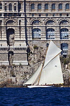 15M Fife cutter ^Tuiga^ sailing past the Oceanographic Museum and Aquarium, at her centenary, Monaco Classics Week, September 2009.