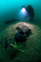 Diver at 30 meters, working near the exposed hull of an unknown wreck off the south coast, UK.. September 2009.