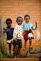 Three young orphans at home for homeless women and orphans, Tananarive, Madagascar, October 2006,  Tananarive, Madagascar, October 2006
