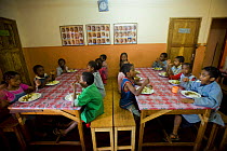 Children eating meal at Home for homeless women and orphans, Tananarive, Madagascar, October 2006