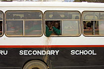 Maasai children travelling in the secondary school bus, Amboseli National Park, Kenya, July 2008