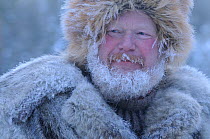 Man at Roros market which has been there since 1854, exhibitors and vendors come from a long way off, travelling by horse and sleigh, -35 degrees centigrade, Dovrefjell National Park, Norway, February...