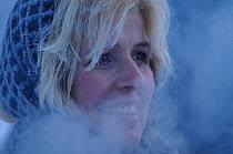 Woman with breath showing in cold air (-35 degrees centigrade) at Roros market started in 1854. Exhibitors and vendors come from a long way off, travelling by horse and sleigh, Dovrefjell National Par...
