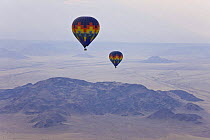 Two hot air balloons flying over the Namib desert, Sossusvlei, Sesriem, Namib desert, Namibia, Africa, August 2008
