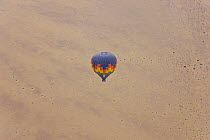 Hot air balloon flying over the Namib desert, Sossusvlei, Sesriem, Namib desert, Namibia, August 2008