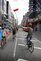 Protesters cycling through central London towards Blackheath for Climate Camp 2009. London, UK. 26/08/09