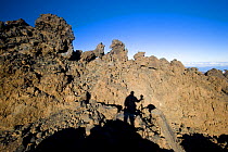 Photographer's shadow on lava fields, Teide volcano (3,718m) at sunrise, Teide National Park, Tenerife, Canary Islands, Spain, December 2008
