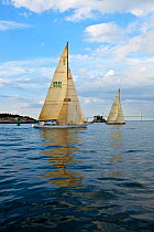 Yachts sailing on calm water during the 12 Metre World Championships, Newport, Rhode Island, USA. September 2009.