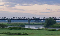 View of an old railway bridge that used to cross the Elbe near Dömitz, Elbe Biosphere Reserve, Lower Saxony, Germany, August 2008