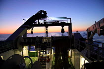 Looking aft on a trawler at dawn, North Sea, September 2009. Property released.