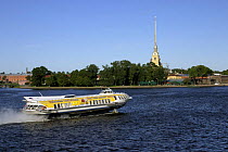 Tourist boat on the River Neva with Petropavlovskaya Fortress in the background, City of St. Petersburg, June 2007