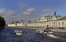 Tourist boats on one of the many channels of the River Nega in St Petersburg, Russia, June 2007
