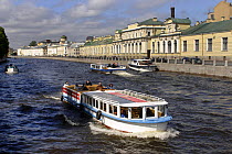 Tourist boats on one of the many channels of the River Nega in St Petersburg, Russia, June 2007