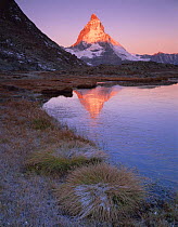 Matterhorn (4,478m) at sunrise with reflection in Riffel Lake, Wallis, Switzerland, September 2008