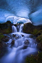 Ice cave with melting ice and waterfall, The Bailey Range, Olympic National Park, Washington, USA. Veolia Environnement Wildlife Photographer of the Year 2009: Highly Commended in the 'Wild Places' ca...