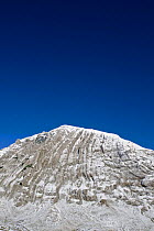 Snow on Prutas peak, showing geological folds, Durmitor NP, Montenegro, October 2008