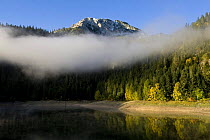 Mist over Black Lake with Big Bear peak in the distance, Durmitor NP, Montenegro, October 2008