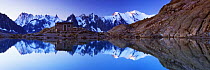 Mountain landscape of Lac Blanc with Aiguilles de Chamonix with small mountain hut at dawn, Haute Savoie, France, Europe, September 2008