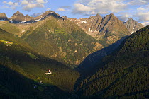 View of mountains with a church in valley, from Kaunerberg, Naturpark Kaunergrat, Ätztaler Alps, Tirol, Austria, July 2008