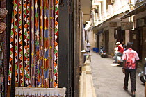Traditional beaded belts for sale in Stone Town, Zanzibar, Tanzania. August 2008.