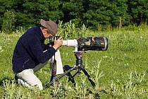 Photographer, Konrad Wothe, taking photographs for Wild Wonders of Europe mission, Slovakia, June 2008