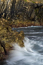 Waves hitting rocks at base of cliffs, Alentejo, Natural Park of South West Alentejano and Costa Vicentina, Portugal, June 2009