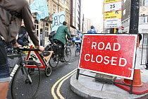 Road closed for 'The Wave' climate change march ahead of the Copenhagen climate summit, cyclists part of the protest, London, UK, 5th December 2009