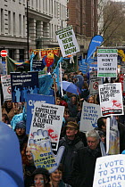 Protesters carrying signs, part of 'The Wave' climate change march ahead of the Copenhagen climate summit, London, UK, 5th December 2009