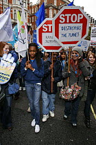 People carrying large 'Stop' signs / banners, part of The Wave climate change march ahead of the Copenhagen climate summit, London, UK, 5th December 2009