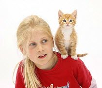 Girl with ginger kitten, 7 weeks, on her shoulder, model released
