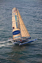 "Guyader pour Urgence Climatique" (Victorien Erussard and Loic Fequet) at the start of the Transat Jacques Vabre race, departing Le Havre, France. 8th November 2009.