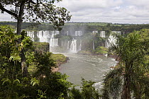 Spray rising from the waterfalls, Iguacu (Iguazu) National Park, Brazil