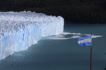 Edge of the Perito Moreno Glacier, with the Argentina National Flag alongside, Los Glaciares National Park, Argentina February 2009