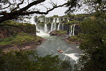 Iguazu Falls and tourist pleasure boat, Iguacu National Park, Argentina February 2009