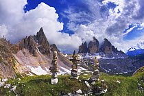 Rock piles with the Paternkofel and Tre Cime di Lavaredo mountains, Sexten Dolomites, South Tyrol, Italy, Europe, July 2009