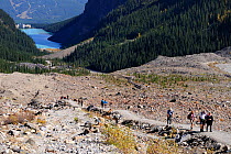 People hiking near Lake Louise, Banff National Park, Rocky Mountains, Alberta, Canada, September 2009