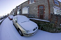 Parked cars covered in snow, Denbigh, Denbighshire, Wales, December 2009