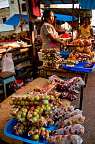 Camu-camu (Myrciaria Dubia) fruit in Belen market, Iquitos, Peruvian Amazon, Peru, August 2008