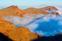 Mountains with low clouds surrounding them, La Caldera de Taburiente National Park, La Palma, Canary Islands Spain, March 2009