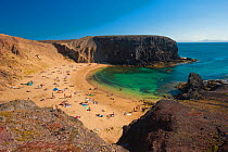 People on Papagayo beach, Lanzarote, Canary Islands, Spain, April 2009