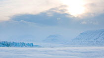 Morning light on the Von Post glacier, Tempelfjorden, West coast of Spitsbergen, Svalbard, Norway, March 2009