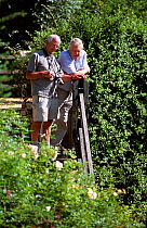 Mike Salisbury and David Attenborough in discussion about a humming-bird hawk moth   sequence for BBC TV production of 'Life in the Undergrowth', Central France. September 2005 Copyright Tom Clarke
