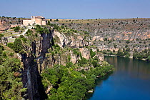 Hermita de San Frutos church on the cliff above river and canyon of Duraton. Castilla y Leon, Spain. June 2008.
